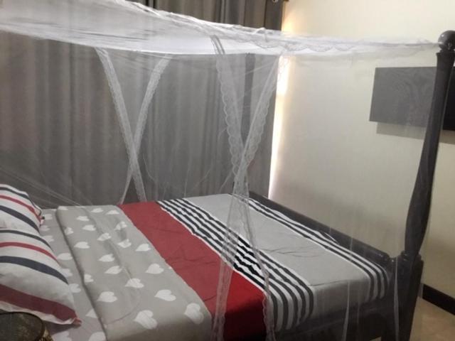 Okra House Hotel Entebbe Buitenkant foto