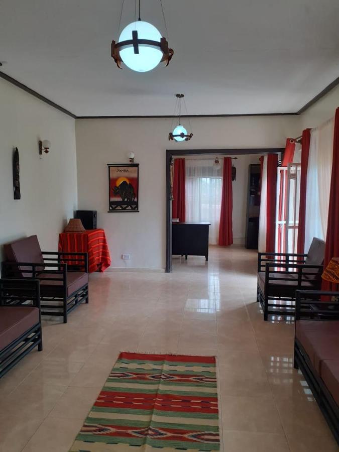Okra House Hotel Entebbe Buitenkant foto